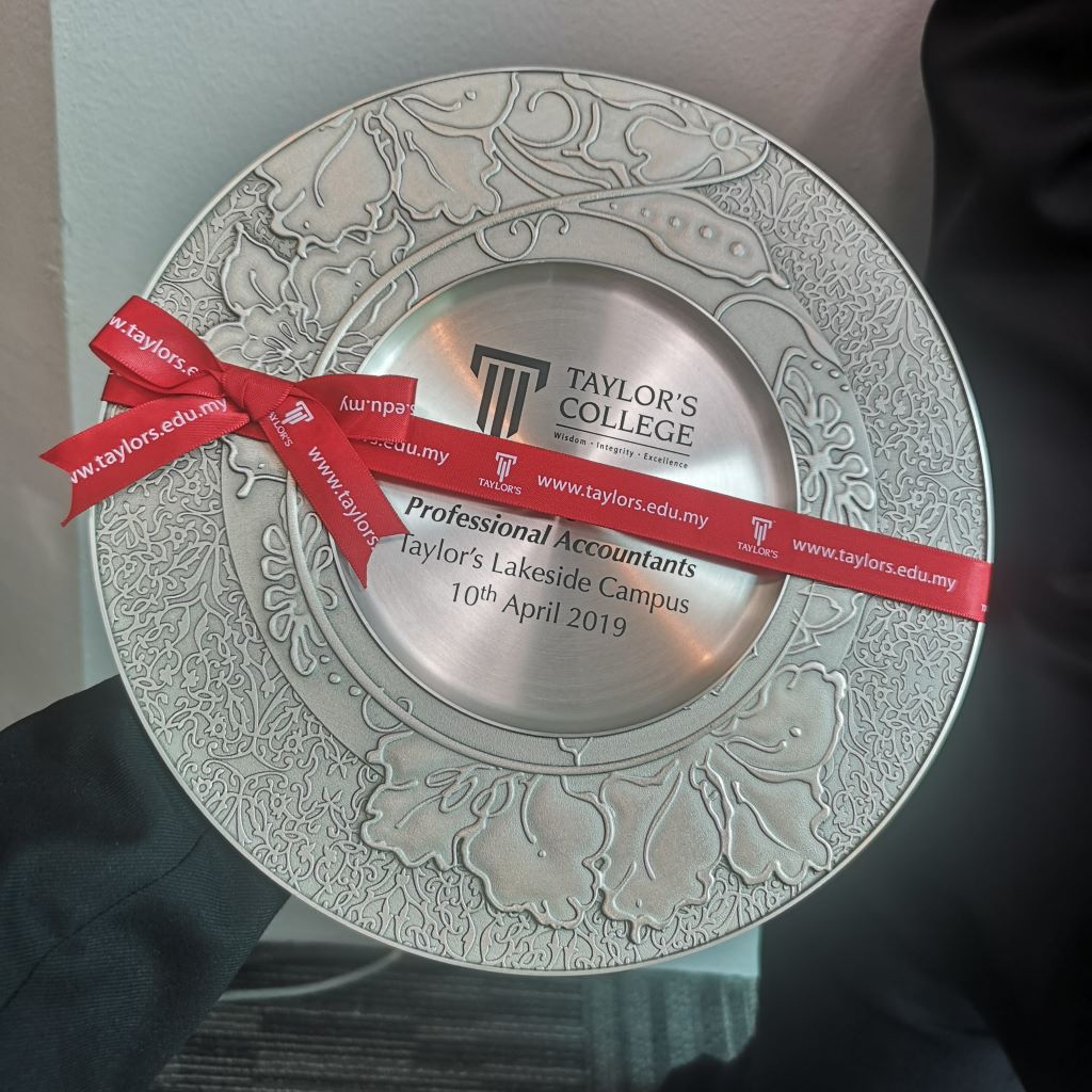 Custom silver plate design to commemorate the launch day.